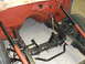 1964 Ford Fairlane - Close-up view of the front chassis and steering system during a vehicle build. The Supermotors.net logo is present in the lower right corne…