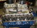 1967 Ford Mustang - Close-up view of a V8 engine dual carburetors and a blue painted engine block.