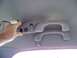 1999 Mercury Grand Marquis - Interior view of grab handles and overhead console with buttons and wires.
