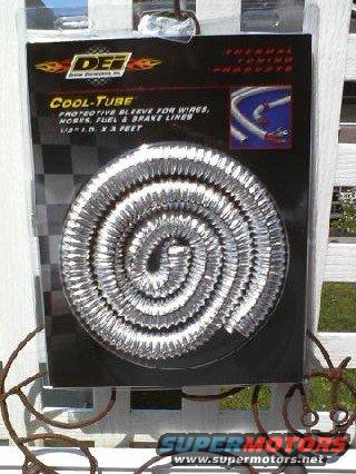 DEF Cool-Tube packaging with coiled silver protective sleeve for wires, hoses, fuel & brake lines