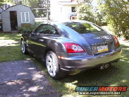 2004 Chrysler Crossfire parked on grass, rear view. License plate HYW-1630