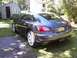 2004 Chrysler Crossfire - Rear view of a 2004 Chrysler Crossfire parked in a residential yard.