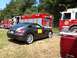 2004 Chrysler Crossfire - A 2004 Chrysler Crossfire is parked near fire rescue vehicles.