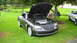 2004 Chrysler Crossfire - 2004 Chrysler Crossfire with hood open, parked outdoors next to another vehicle.