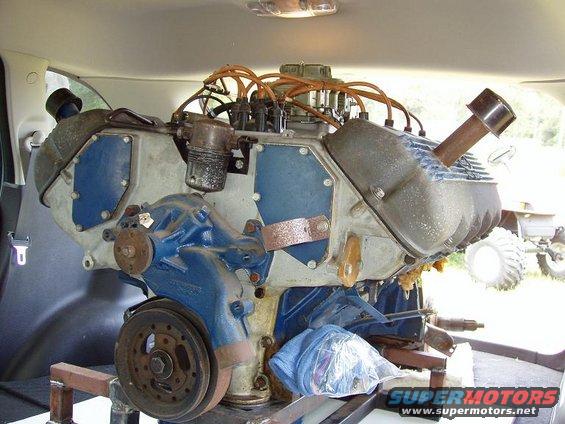 Engine with blue accents and orange spark plug wires