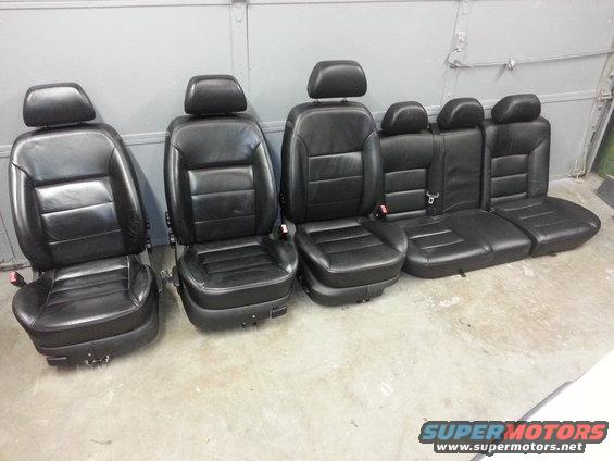 Black leather car seats, front and rear sections