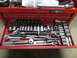 2004 Aston Martin Virage - A red tool chest drawer is filled with a collection of sockets and ratchets.