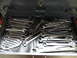2004 Aston Martin Virage - A collection of wrenches is neatly organized in a toolbox drawer, ready for use.