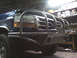 1989 Ford Bronco - Custom brush guard on a blue Ford F-Series truck.