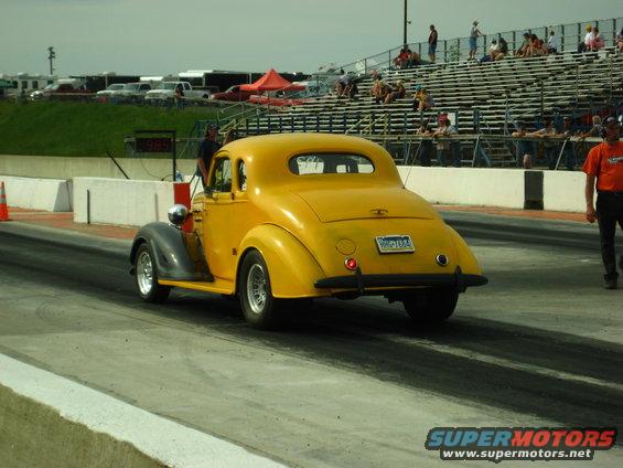 1935 Chevrolet New coupe hot rod on drag strip, rear view
