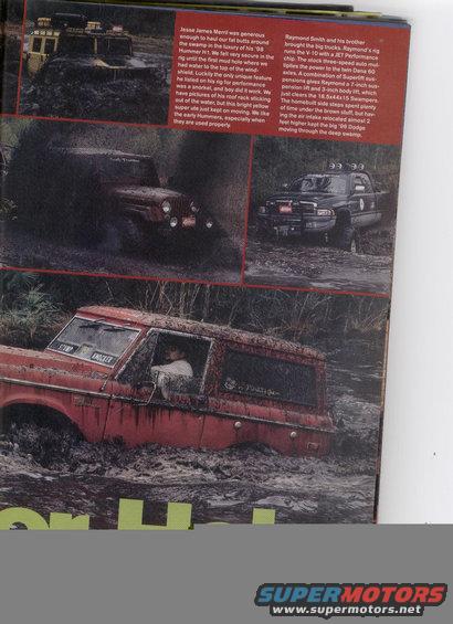 Red SUV stuck in mud, text on door reads "STUMP JUMPER"