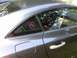 2004 Chrysler Crossfire - Interior view of a gray coupe, a pink flip flop decal on the rear passenger window.