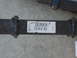 1988 Ford Bronco - A leaf spring with a part number is shown against a concrete surface.