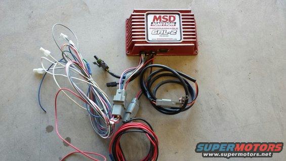 Red MSD Ignition programmable EAL-2 unit with a bundle of multicolored wires and connectors