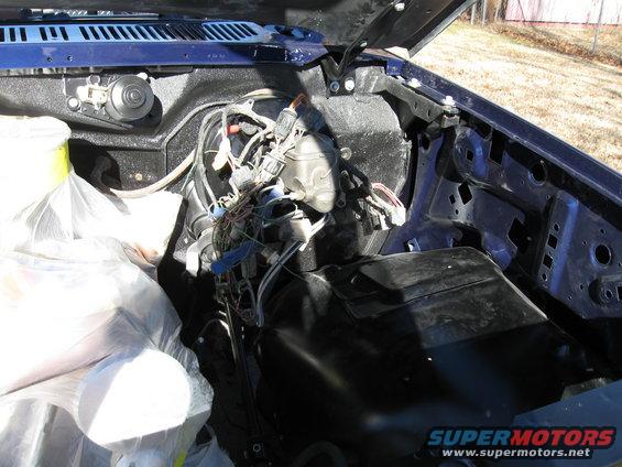 Interior view of a dark blue SUV, showing dashboard and seats