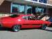 1971 Ford Ranchero - Red 1971 Ford Ranchero Cobra S parked outside a building with hood open.