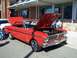 1971 Ford Ranchero - This red 1964 Ford Falcon coupe is displayed with its hood open, revealing the engine bay.