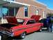1971 Ford Ranchero - 1964 Ford Falcon with open hoods and trunk, parked outdoors next to another vehicle.