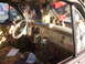 1971 Ford Ranchero - The dashboard is adorned with various trinkets and personalizations, including pinstripes and hanging cans.