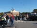 1971 Ford Ranchero - Several classic cars are on display outdoors with people milling about.