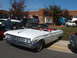 1971 Ford Ranchero - A white convertible is parked at an outdoor car show in front of Dawson County Middle School.