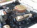 1971 Ford Ranchero - Close-up of a vehicle's engine bay, showing the "390" engine components and air filter assembly.