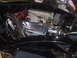 1971 Ford Ranchero - Engine bay features chrome valve covers with 'Packard' branding and an aftermarket air intake system.