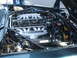 1971 Ford Ranchero - Close-up of a Jaguar V12 engine, showing the intake manifold and cooling fan.