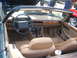 1971 Ford Ranchero - Interior view of a convertible showing tan leather seats, dashboard, and steering wheel.