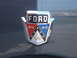 1971 Ford Ranchero - Ford emblem detail on a vehicle's exterior.