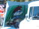1971 Ford Ranchero - Custom artwork of a Smurf is painted on the underside of the hood of a white truck.
