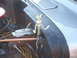 1971 Ford Ranchero - A Bugs Bunny figurine is placed in the engine bay of a vehicle, near the brake fluid reservoir.