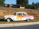 1971 Ford Ranchero - This race car displays sponsor names and the number 53 on its side.