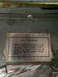 1997 Dodge 3500 - A close-up of a metal label detailing safety clearances for installation.