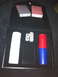 1984 BMW 3 Series - This poker set includes two decks of cards, four dice, and red and blue chips inside a black case.