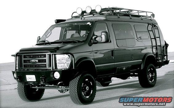 Black Ford E-Series van with off-road modifications, roof rack, and ladder