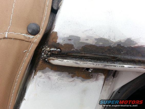 20131231_110003.jpg started welding up the corner where the cracks were.