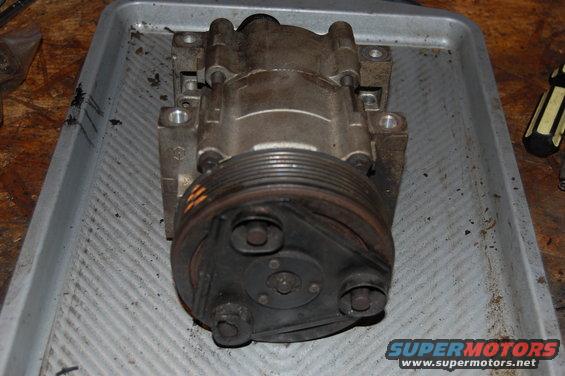 Ford FS 10 Ac compressor removed from a 1994 ford bronco. This compressor seized without warning in stop and go traffic.
The engine continued to drive the clutch after it seized, ruining it and overheating to the point that the rubber isolators caught fire. A electric radiator fan was installed but not on at the time. suspected failure was overheating from excessive head pressure.