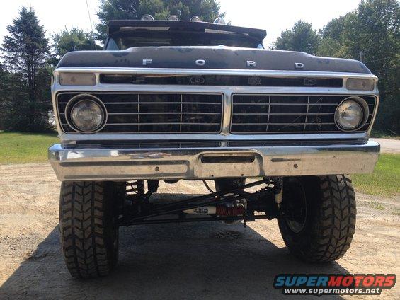 Front view of a 1970 Ford F-250 with chrome bumper and grille