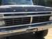 1970 Ford F-250 - Close-up of a Ford truck's front end, highlighting the grille and hood lettering.