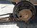 1970 Ford F-250 - Close-up of a worn and rusted rear drum brake assembly, showing the brake shoes, springs, and wheel cylinder.