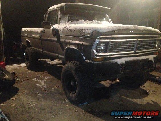 1970 Ford F-250 3q-front view with snow on hood and roof