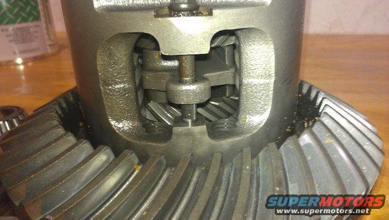 Close-up of differential gears with visible teeth and internal mechanisms