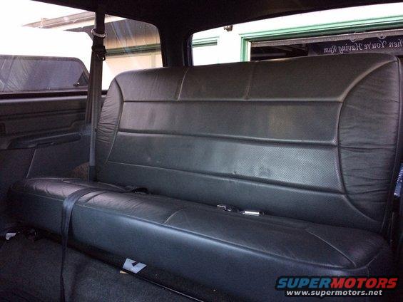 Black leather rear seat with seatbelt