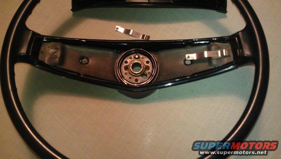 Steering wheel interior with metal hub and mounting points