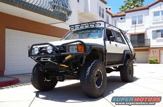 1985 Toyota 4Runner with aftermarket bumper, winch, and roof rack