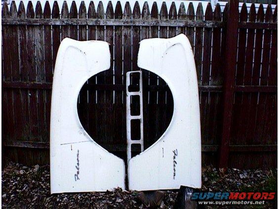 Pair of white fenders with 'Falcon' script