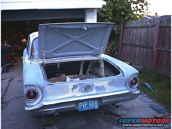 1960 Ford Falcon rear with open trunk and license plate PVP 668
