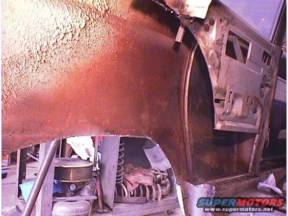 Rusty car door interior and wheel well, 1960 Ford Falcon registry claim is incorrect