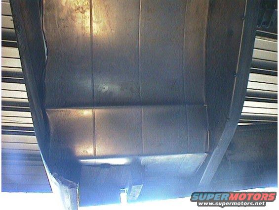 Underside of vehicle with visible SuperMotors logo